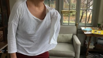 Taking shirt off, start with strong arm